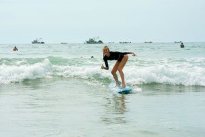 Stretching before Surfing Montañita’s Waves